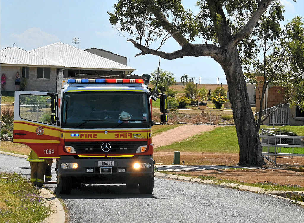 Fire crews refill their tanks on Condavale Dr.
